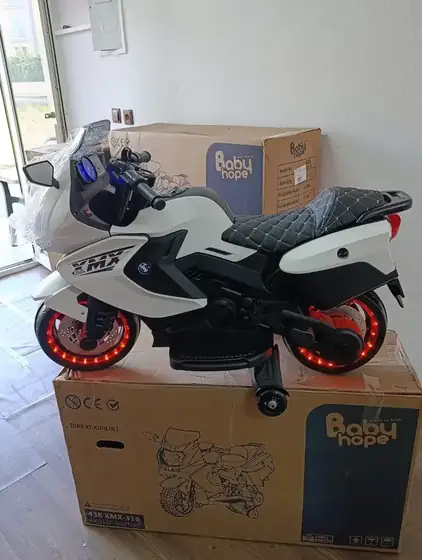 Satışta olan beyaz ikinci el akülü çocuk motoru